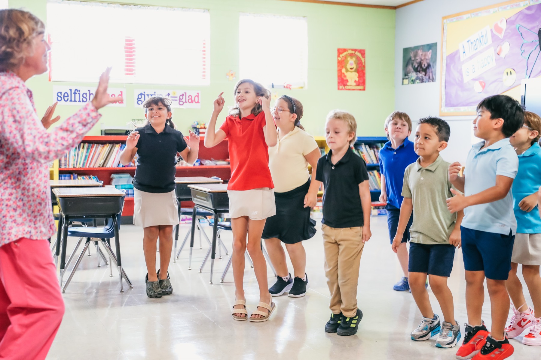 Trinity Christian Academy students singing together in class