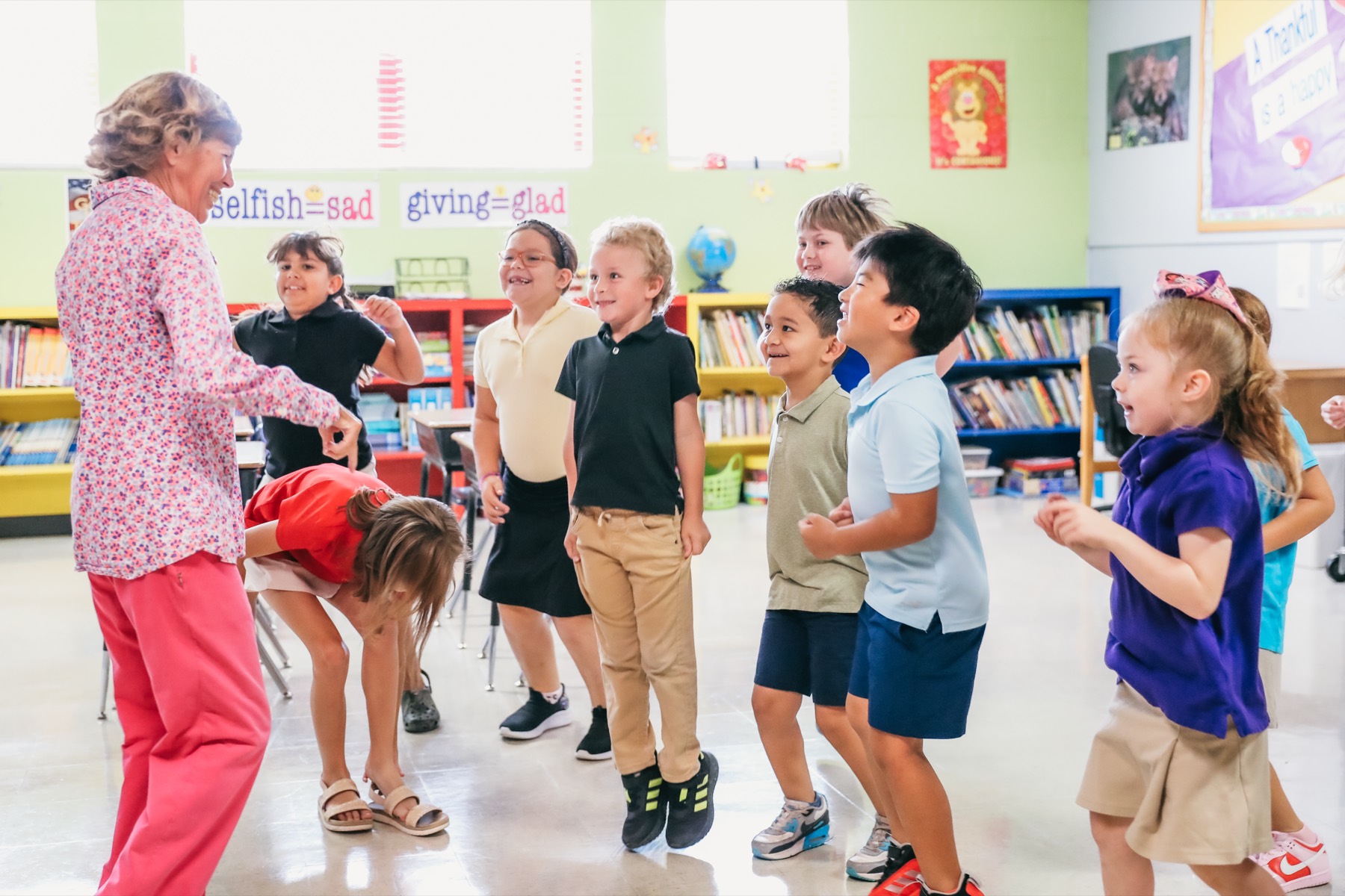 A Trinity Christian Academy teacher leading her class in a song